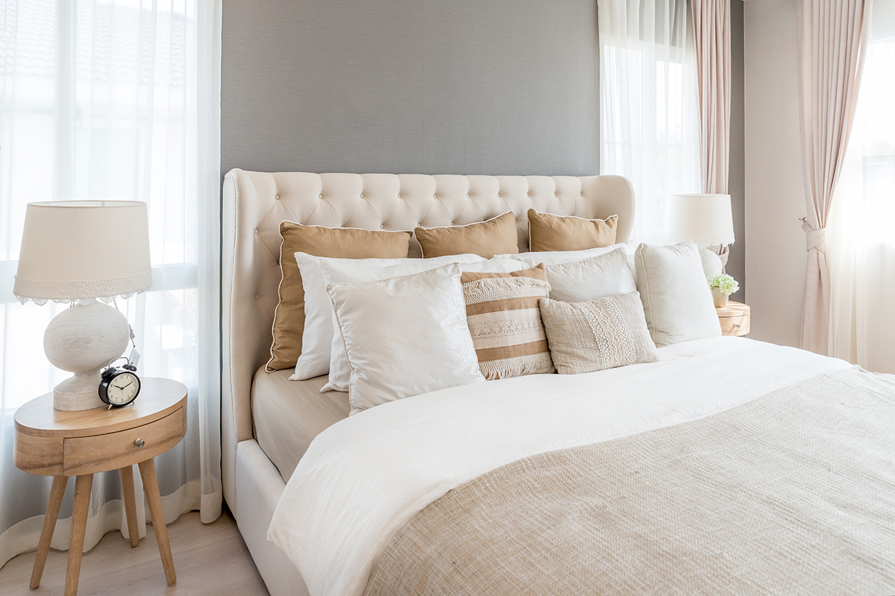 bedroom-in-soft-light-colors-big-comfortable-double-bed-in-elegant-classic-bedroom-at-home-835932468_6100x4067 (1)