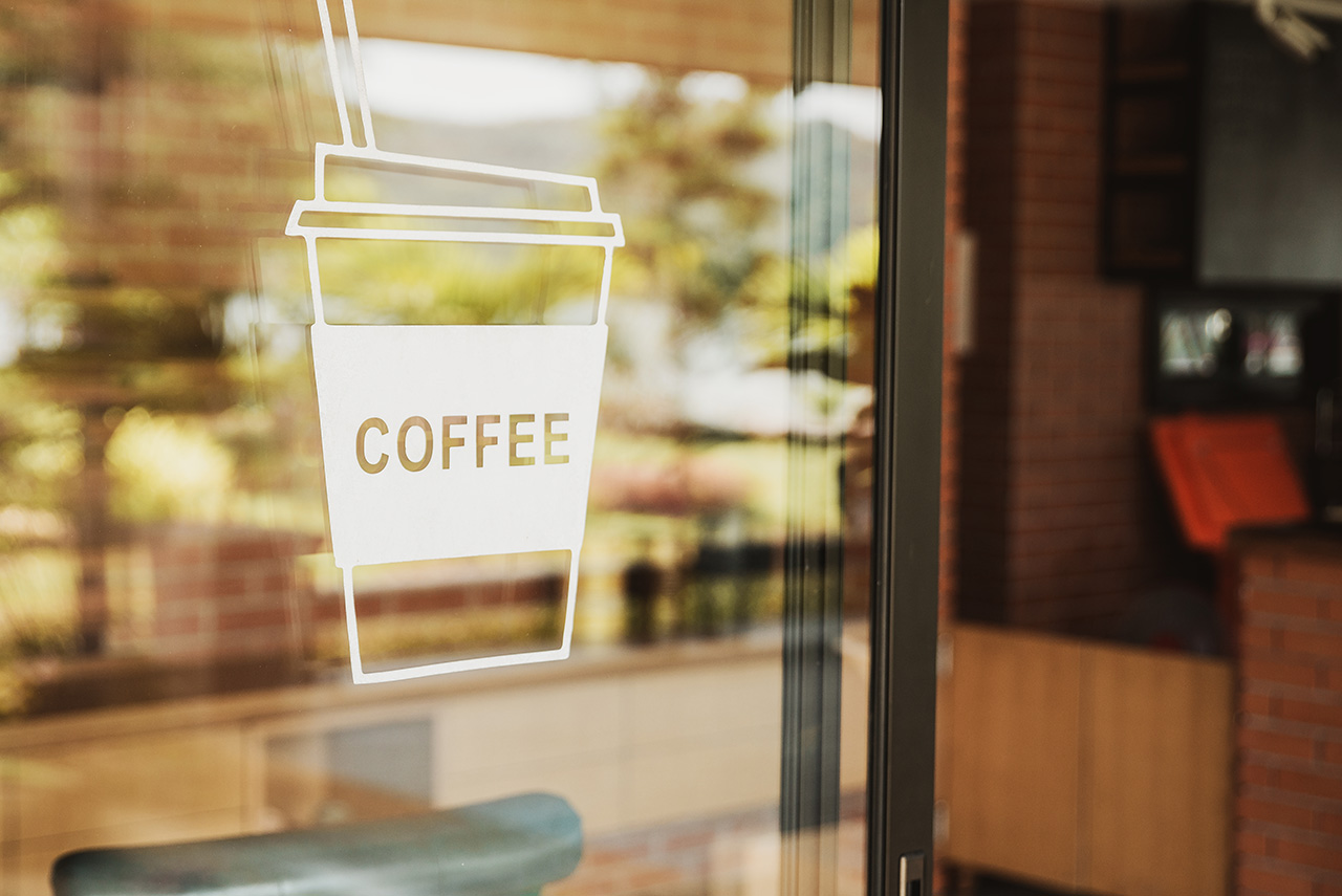 luxury-coffee-shop-sign-on-the-glass-door-for-art-texture-or-web-design-backgrund-1030151188_5000x3338